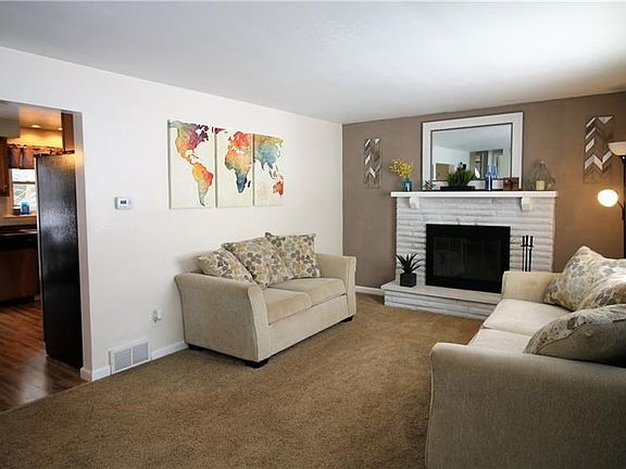 Living room leads right into open dining/kitchen area