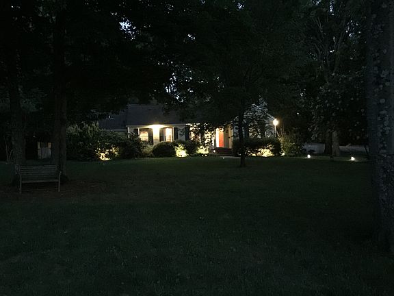 Great front yard with landscape lighting.