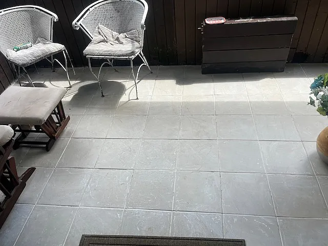 Spacious tiled big balcony with French doors to master bedroom and the living room.