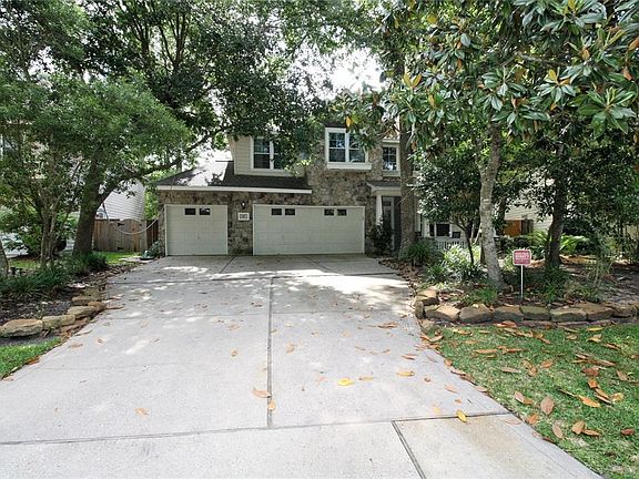 This magnificent property boasts this amazing front yard lan