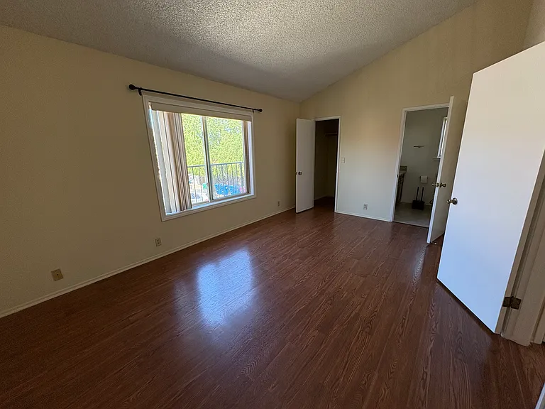 Huge bedroom with cathedral ceilings and private bathroom