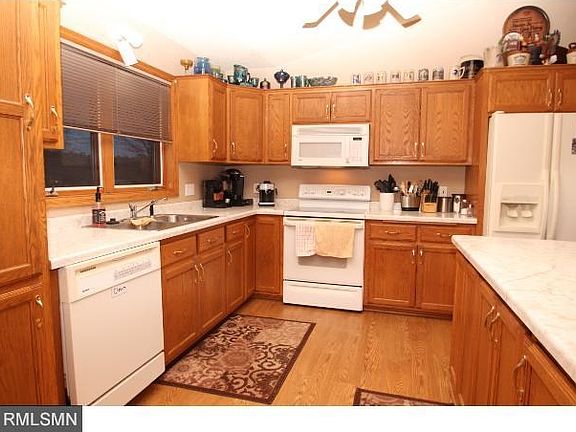 Kitchen with great cabinet space, a breakfast bar and all appliances.