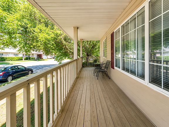 Sunlit front porch with a view