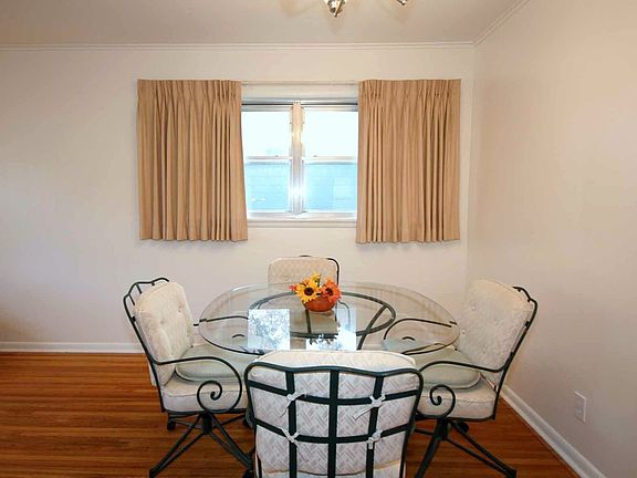 Dining area is easily accessible to kitchen.