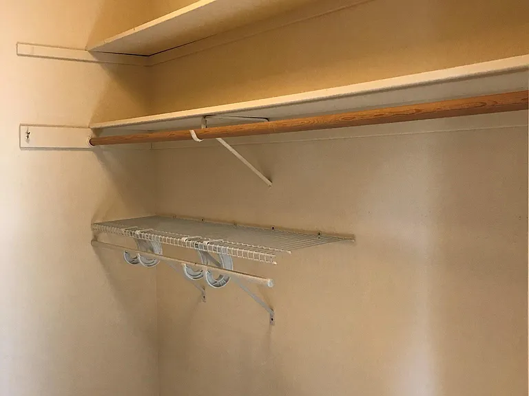 Walking closet in master bedroom