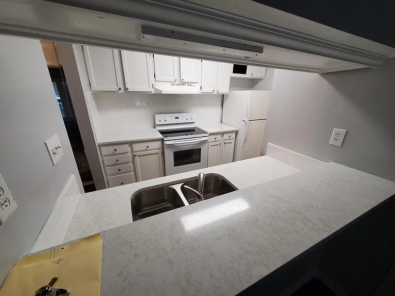 New granite and backslash in kitchen.