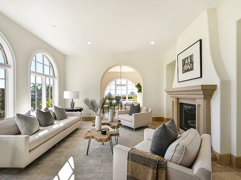 Spacious Living Room with Fireplace and abundant natural light
