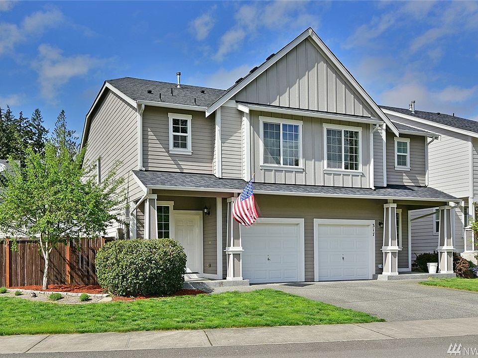 1st image of 323 NE Miramar Cir