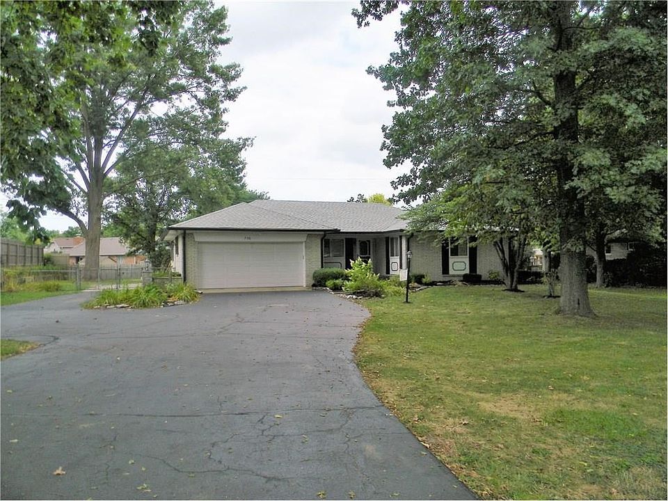Notice drive goes to side of house for parking beyond front of home!