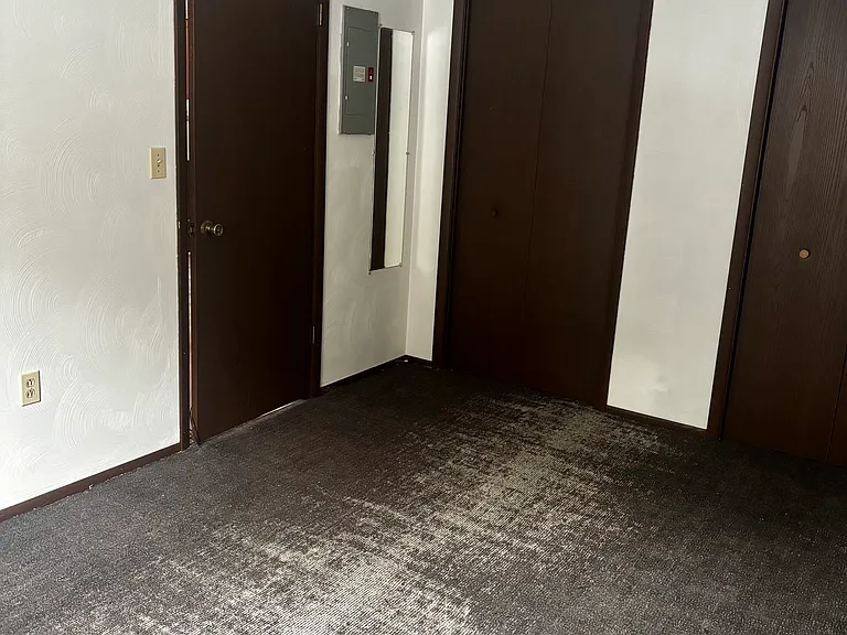 Bedroom featuring 2 closets
