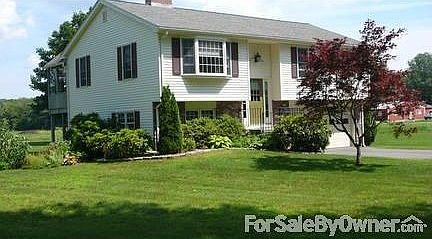 Front, West Exposure : Large front yard with gardens