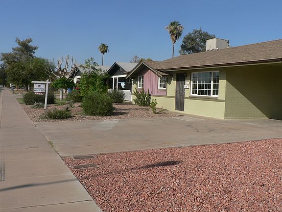 Side View of Home, Car port to right