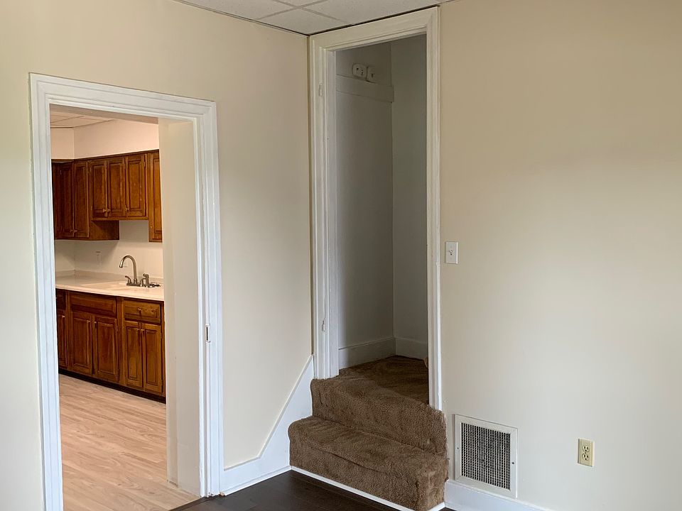 Dining Room looking into Kitchen and upstairs