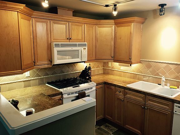 Kitchen with Gas Stove, dishwasher, microwave, and plenty of