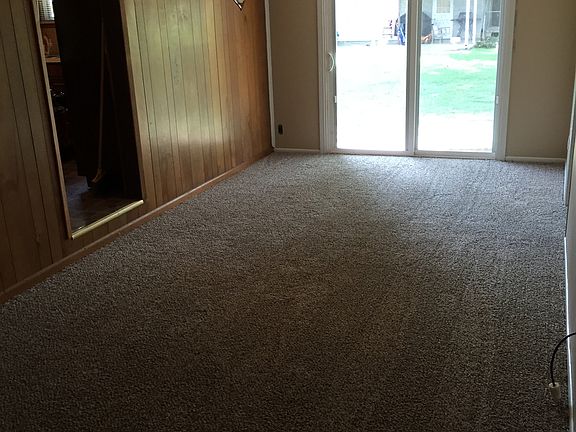 Den with sliding doors