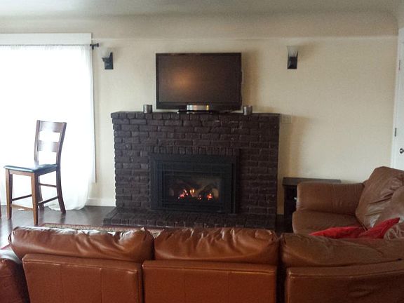 propane fireplace in open living room space