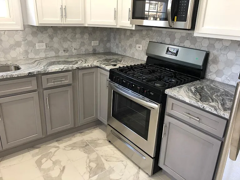 Granite Countertop with two tone Cabinets