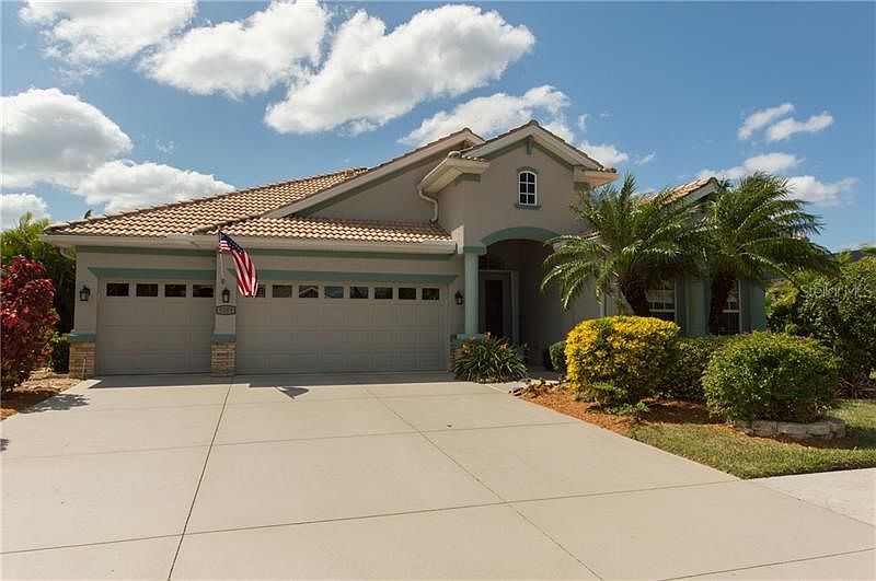 Fabulous 4 bedroom, 3 bath, 3 car garage pool home on the 8th Hole of the Creek Golf Course.