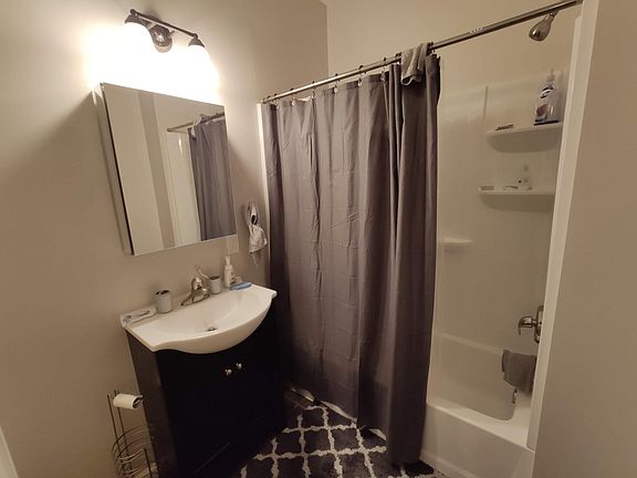 Updated bathroom with tub