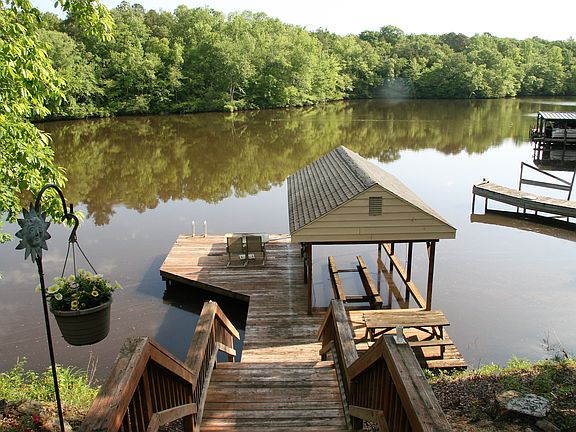 View of the dock and wooded 