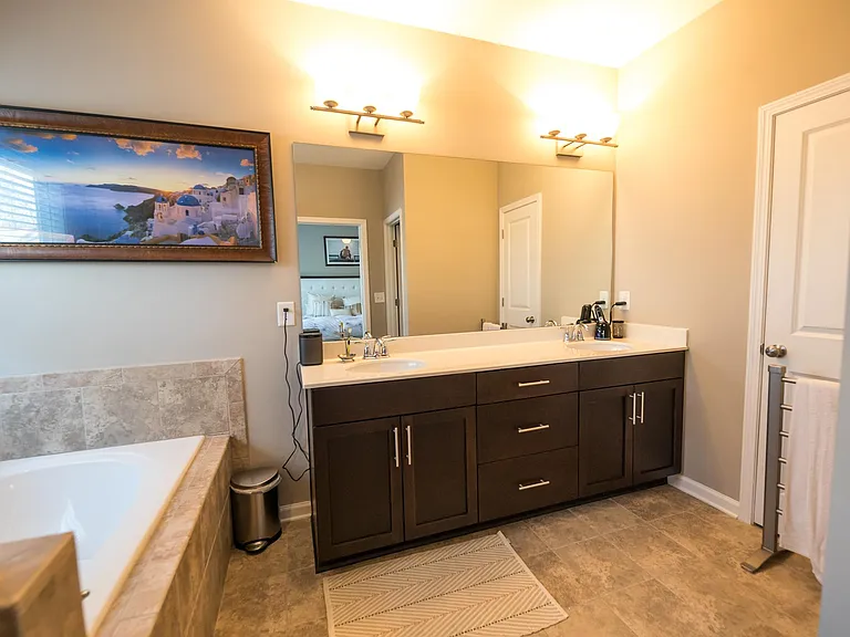 Massive Master suite w/ double vanity and tons of storage in