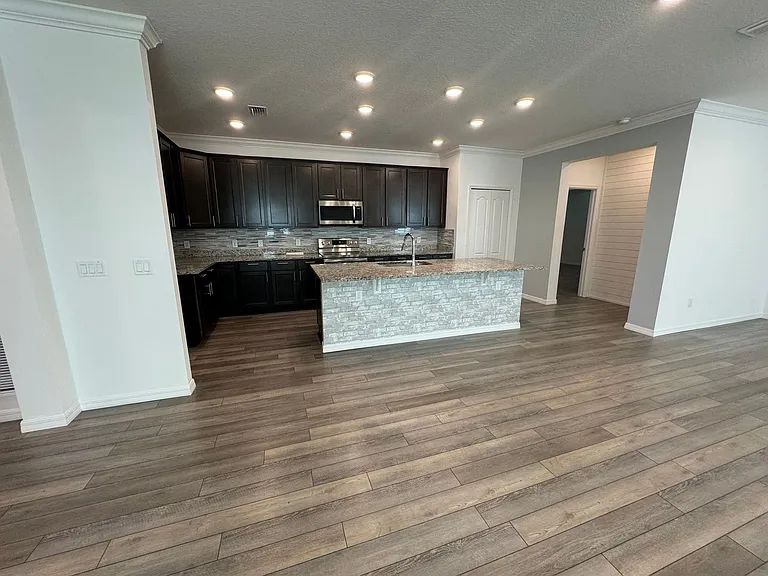 24429 NW 7th Ln — Photo 10
