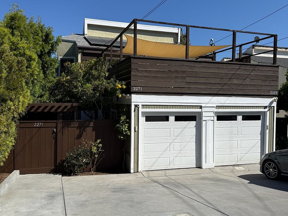Private gated entry, two parking spots, and a large 440 sq. ft. deck offering peek ocean views