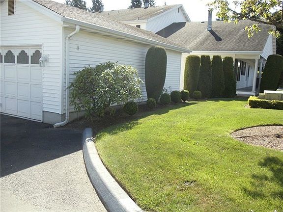 Detached garage is finished and painted inside.