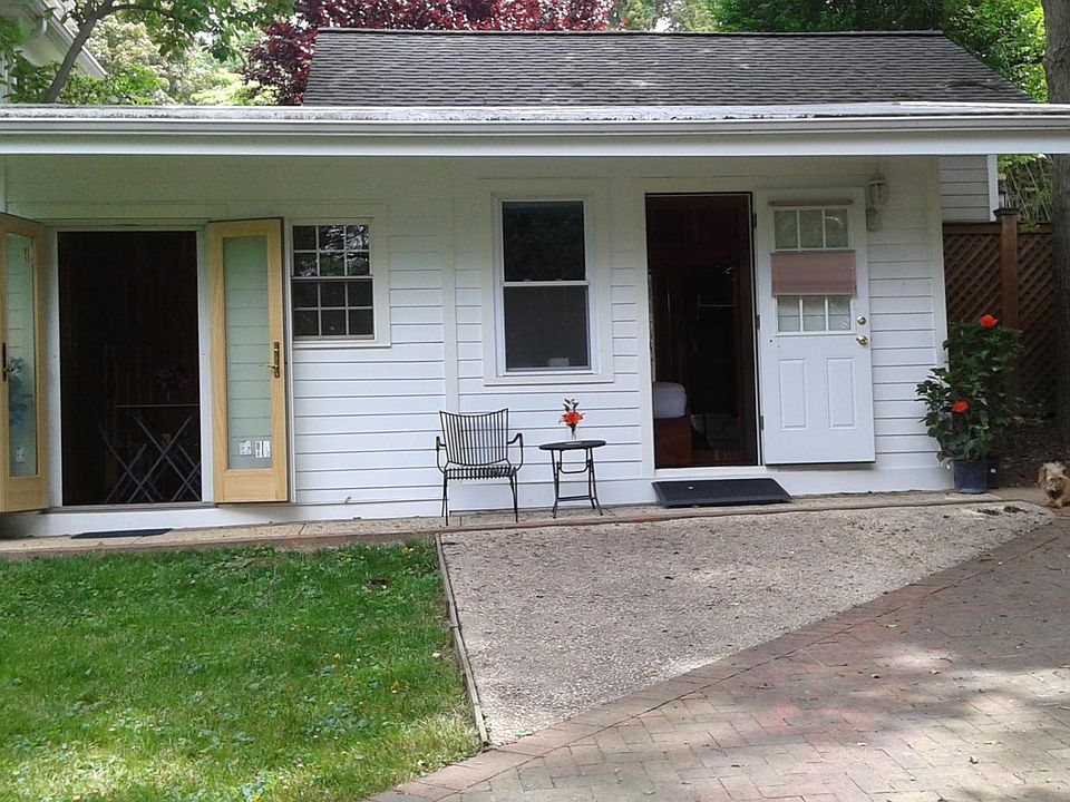 Front view of cabin, open doors.