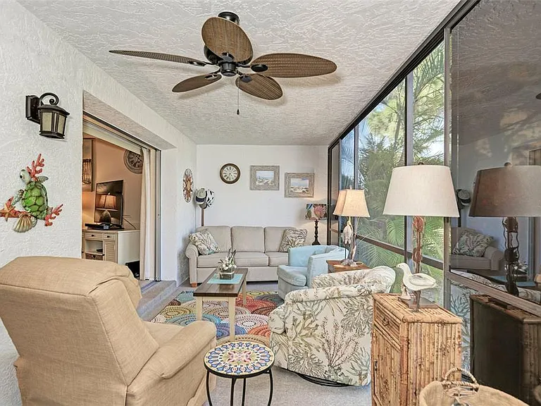 Your private sanctuary awaits. __ We love the open, airy feel of this space! With comfortable seating and flexible sliders, you can customize your view and your comfort. The perfect spot to get lost in a good book.