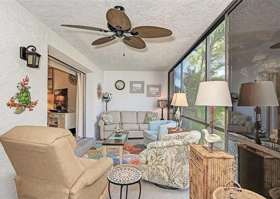 Your private sanctuary awaits. __ We love the open, airy feel of this space! With comfortable seating and flexible sliders, you can customize your view and your comfort. The perfect spot to get lost in a good book.