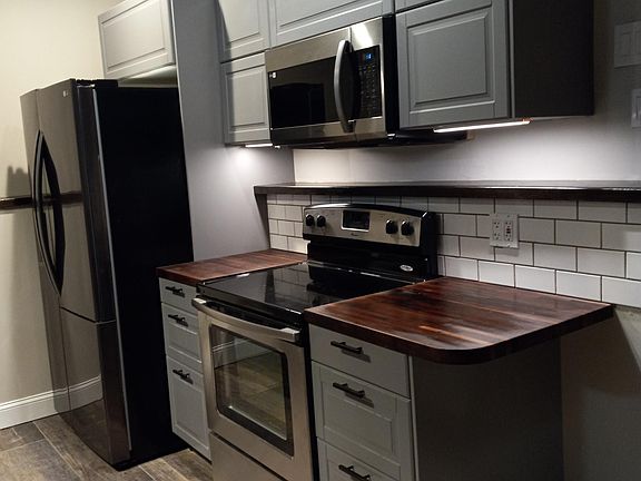 Under cabinet lighting. Refrigerator with Ice maker and water dispenser