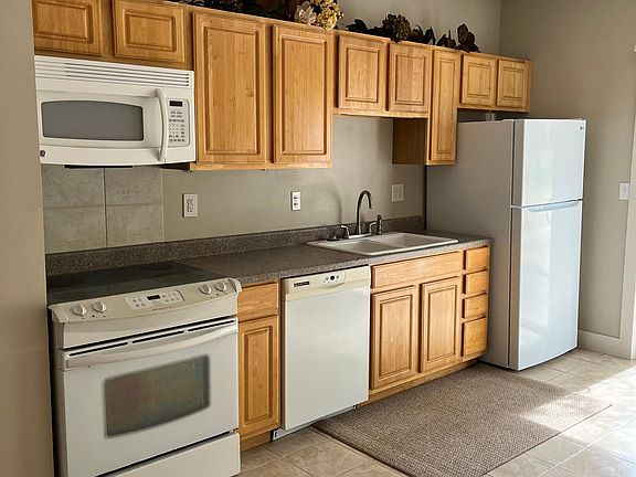 Kitchen with nice appliances including a new refrigerator