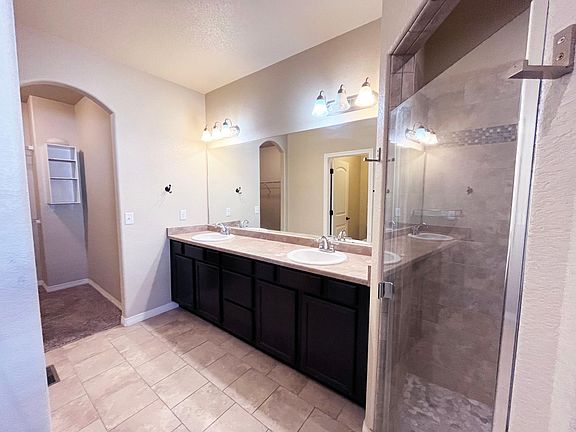 main floor large bathroom with walk-in closet
