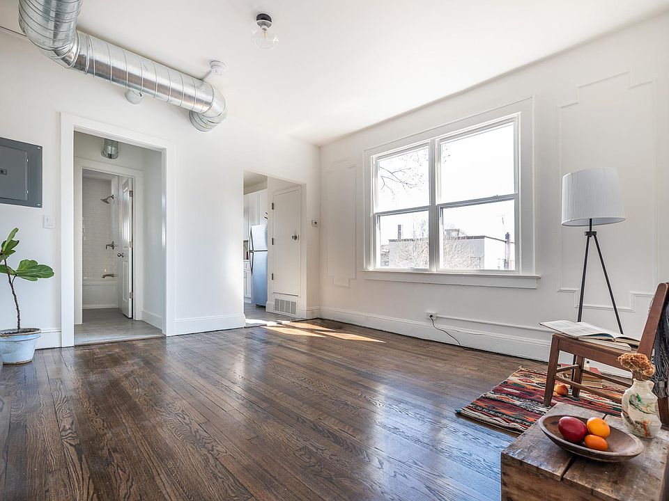 Living Room with Bath (l) and Kitchen (r)