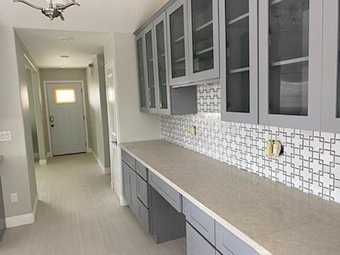 Side Kitchen Workspace with display cabinets w lights