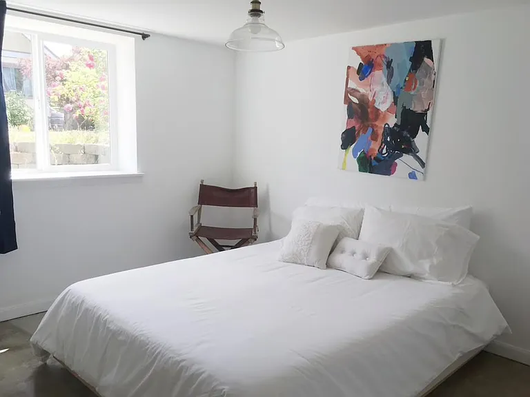 Large bedroom w/ closet. Lots of natural light