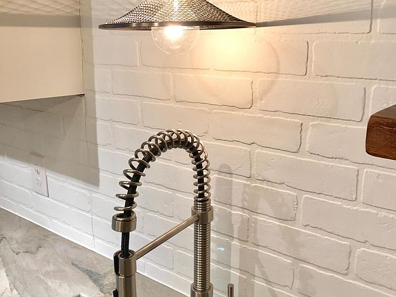 Modern Faucet & Hinkley Lighting Sconce