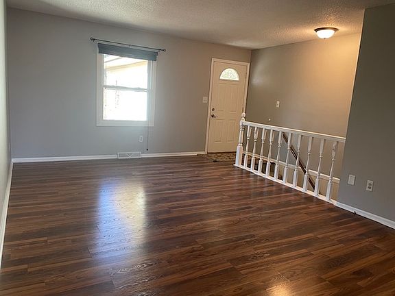 Front entrance into large living room