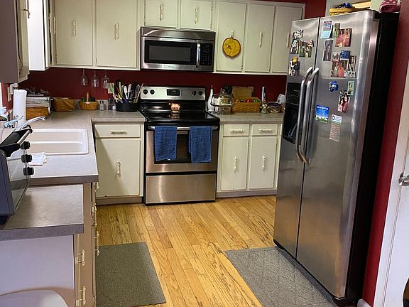 Kitchen has all stainless appliances.