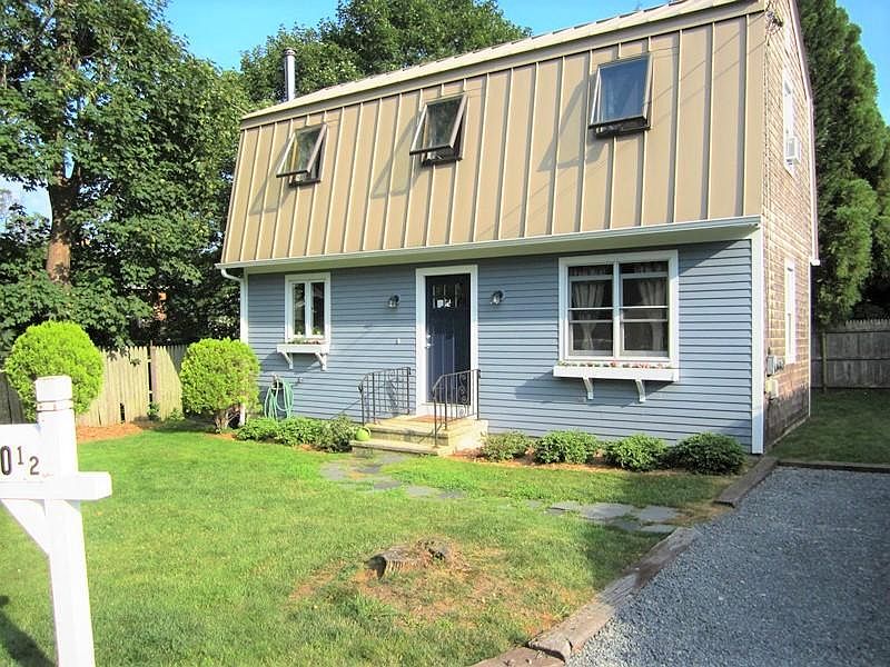 Front of house, 2-car driveway