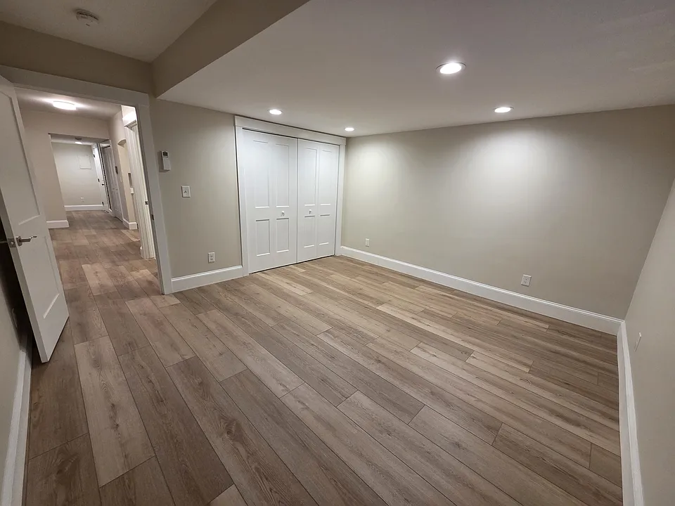 Bedroom with large double-door closet