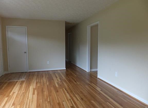 Living room view down the hall to the bedrooms,