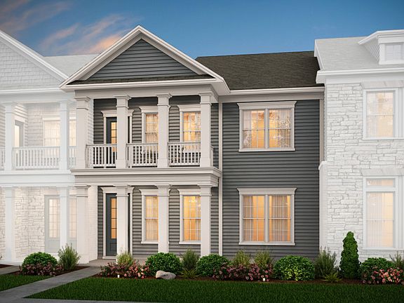 Savannah Exterior 3 features Hardi Board siding, covered front porch and deck, and rear 2 car garage