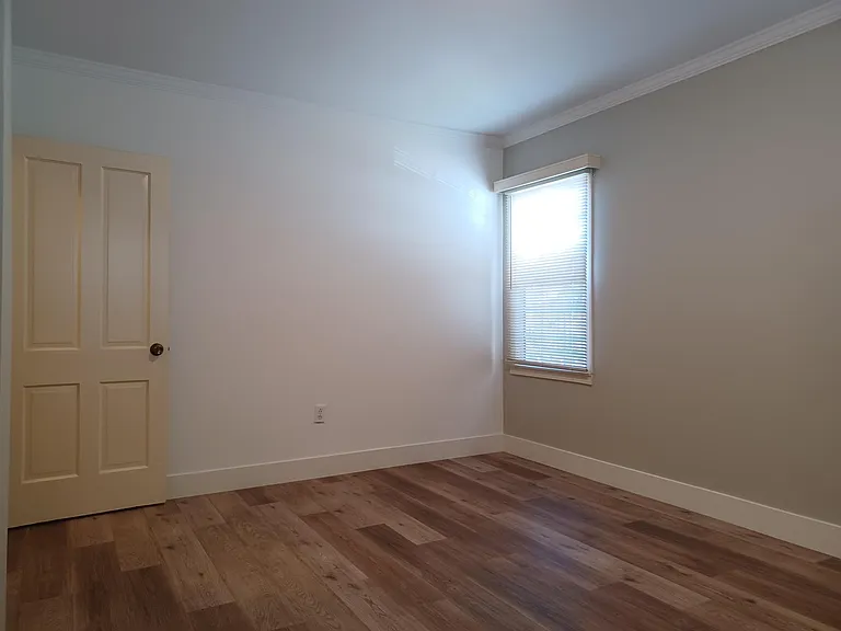 Left side bdrm showing west facing window.