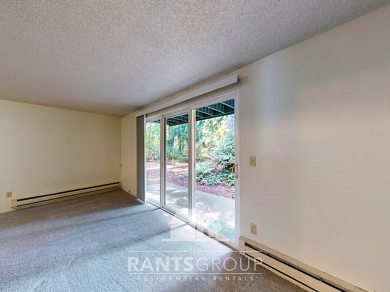 Lovely, wooded 2-bedroom apartment with a large private deck and in-unit washer & dryer! — Photo 17