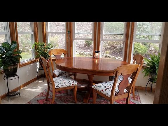 Beautiful 3 season sun room to enjoy the wildlife.