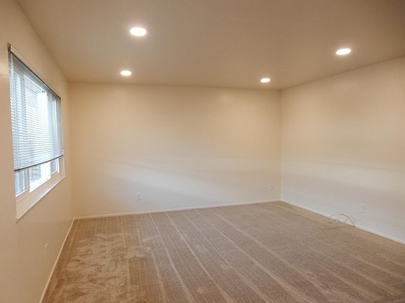 Living Room with new recessed lighting and new carpet