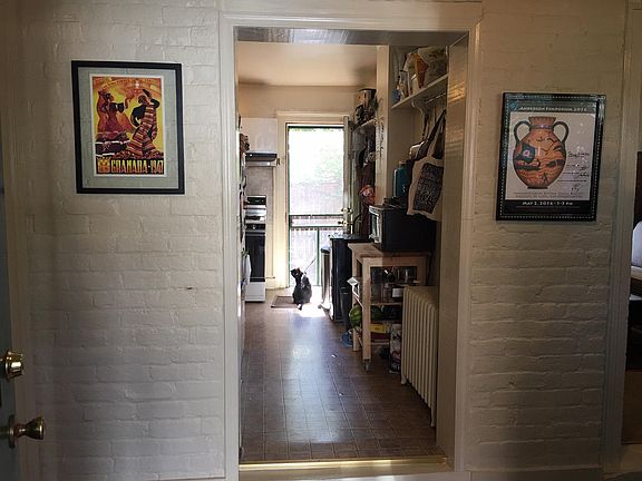 View from entry into kitchen and door to back patio.