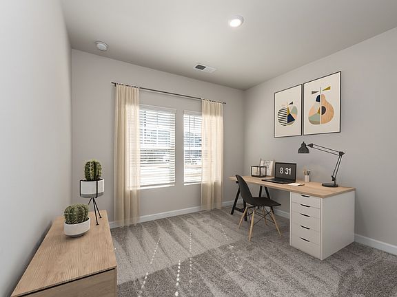 The main-floor bedroom makes the perfect home office, media room or private guest suite.